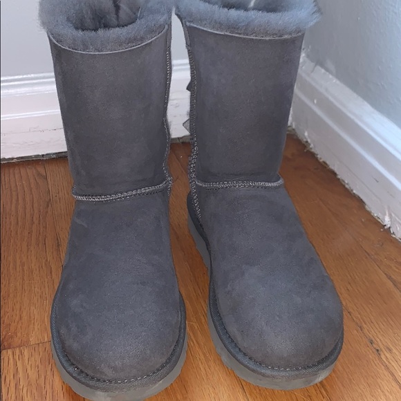 UGG Bailey Bow Boots that are a light grey color. - Picture 5 of 6